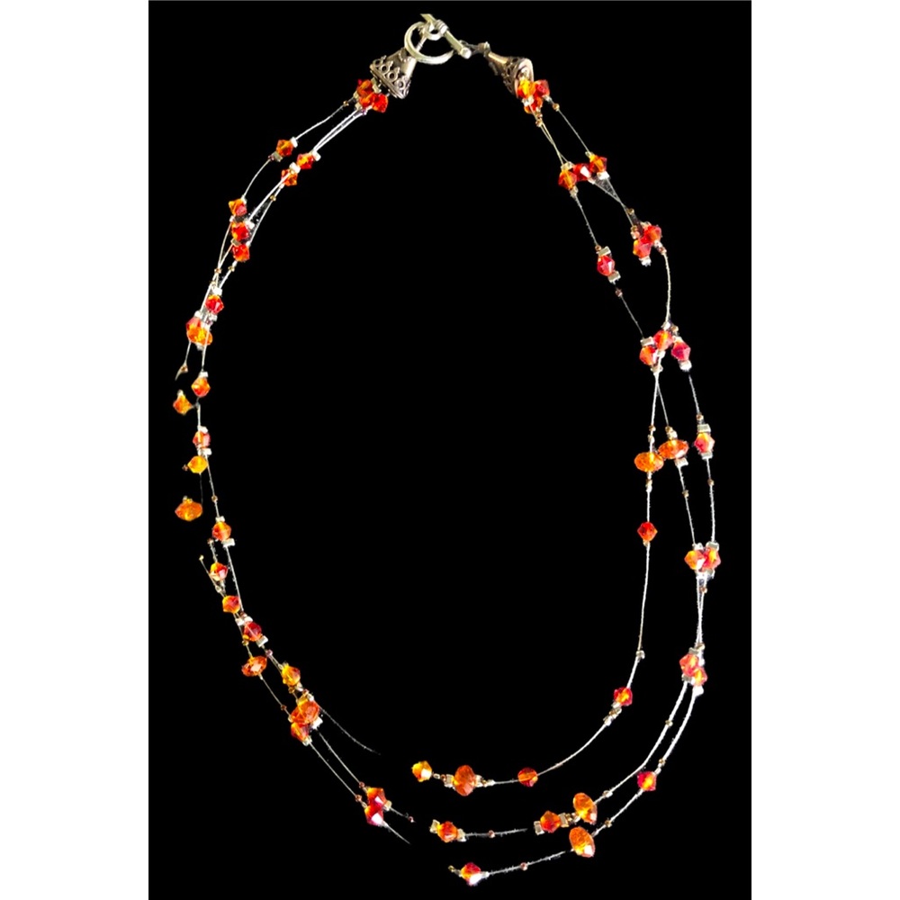Orange beaded necklace.